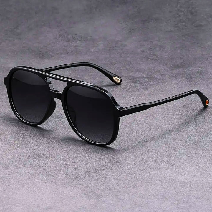 Black frame unisex vintage UV400 sunglasses with glare protection. Trendy eyewear for summer accessories.