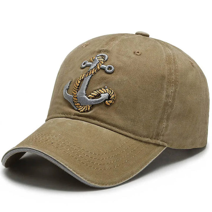 Stylish vintage washed baseball cap with a unique anchor patch. Unisex adjustable cotton hat for a classic casual look.