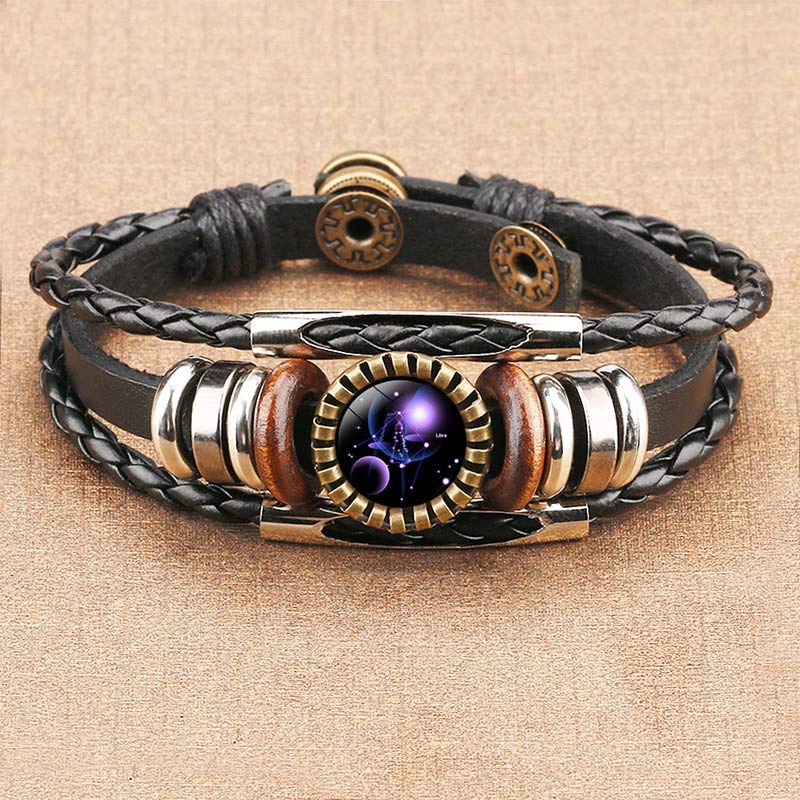 Vintage astrological charm bracelet, a unisex retro jewelry piece with elegant zodiac detailing.