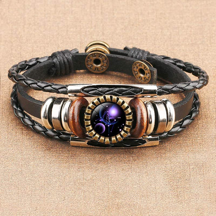 Vintage astrological charm bracelet, a unisex retro jewelry piece with elegant zodiac detailing.