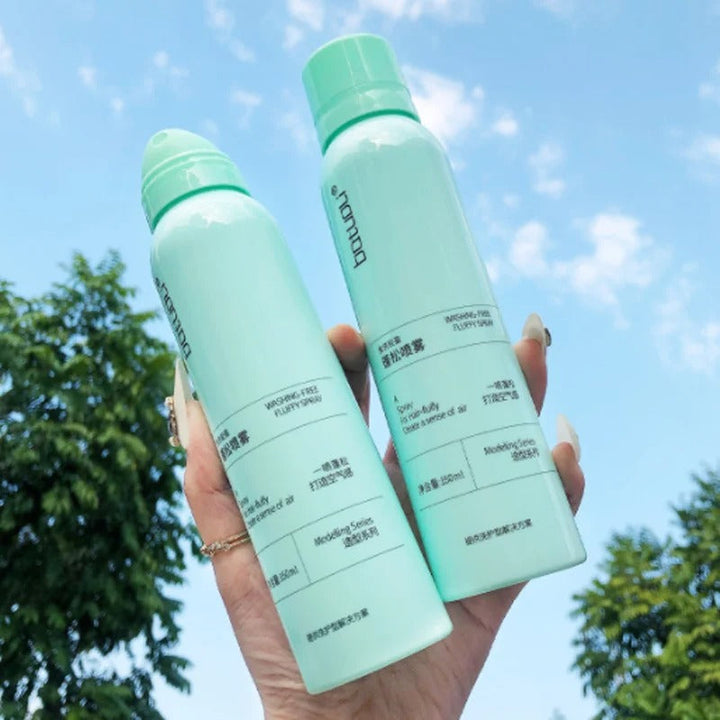 Unisex VoluBoost instant volume hair spray. Long-lasting root lift & frizz control for all hair types. Quick-dry formula.
