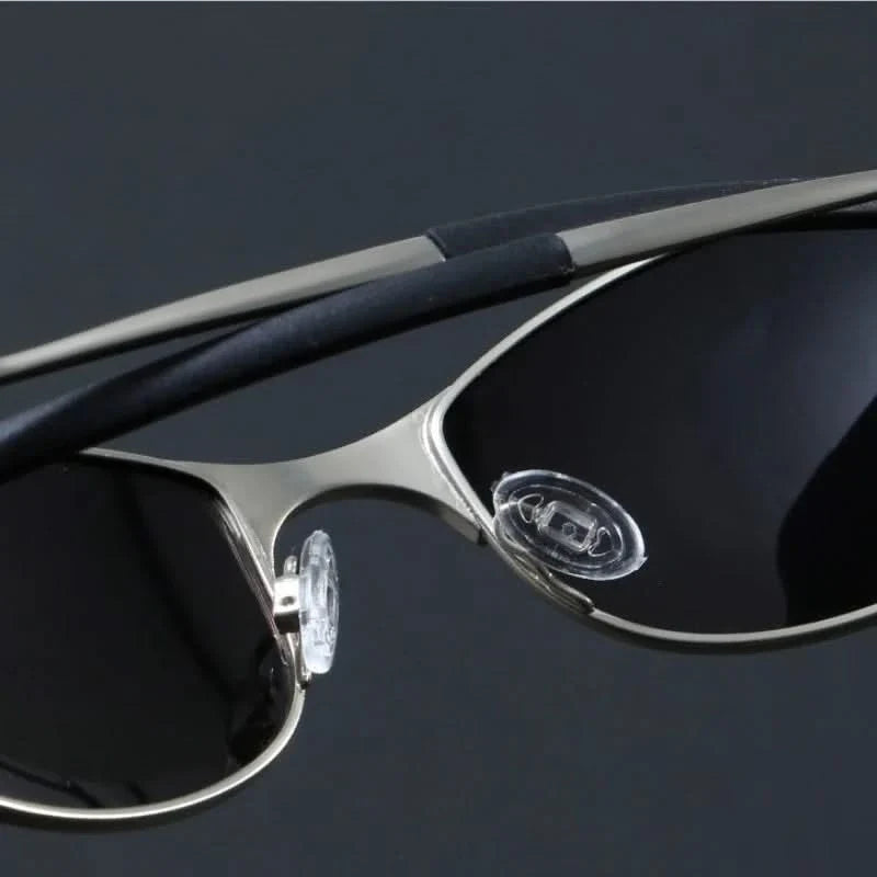 Silver Vortex unisex sport performance sunglasses. Durable, lightweight activewear accessory with polarized lenses.