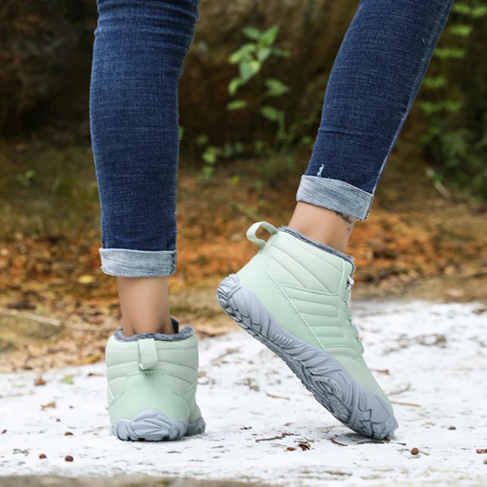 Durable FrostFlex unisex snow boots, slip-resistant grip for safe winter adventures & cold weather walks.