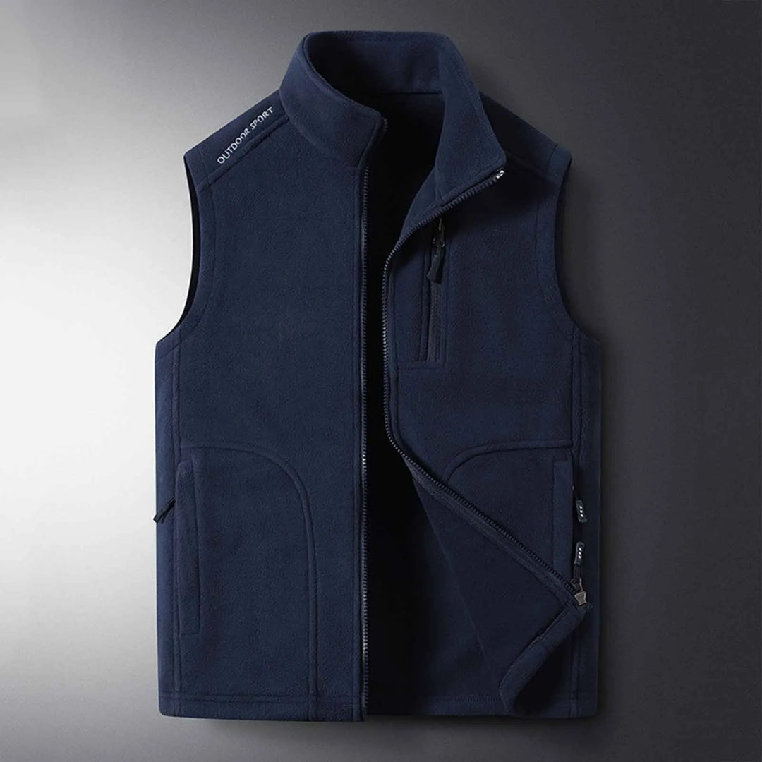 Warm outdoor travel vest, unisex fleece for easy layering. Lightweight and insulated for adventure and active use.