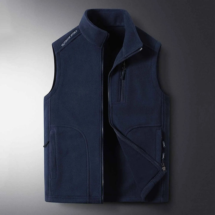 Warm outdoor travel vest, unisex fleece for easy layering. Lightweight and insulated for adventure and active use.