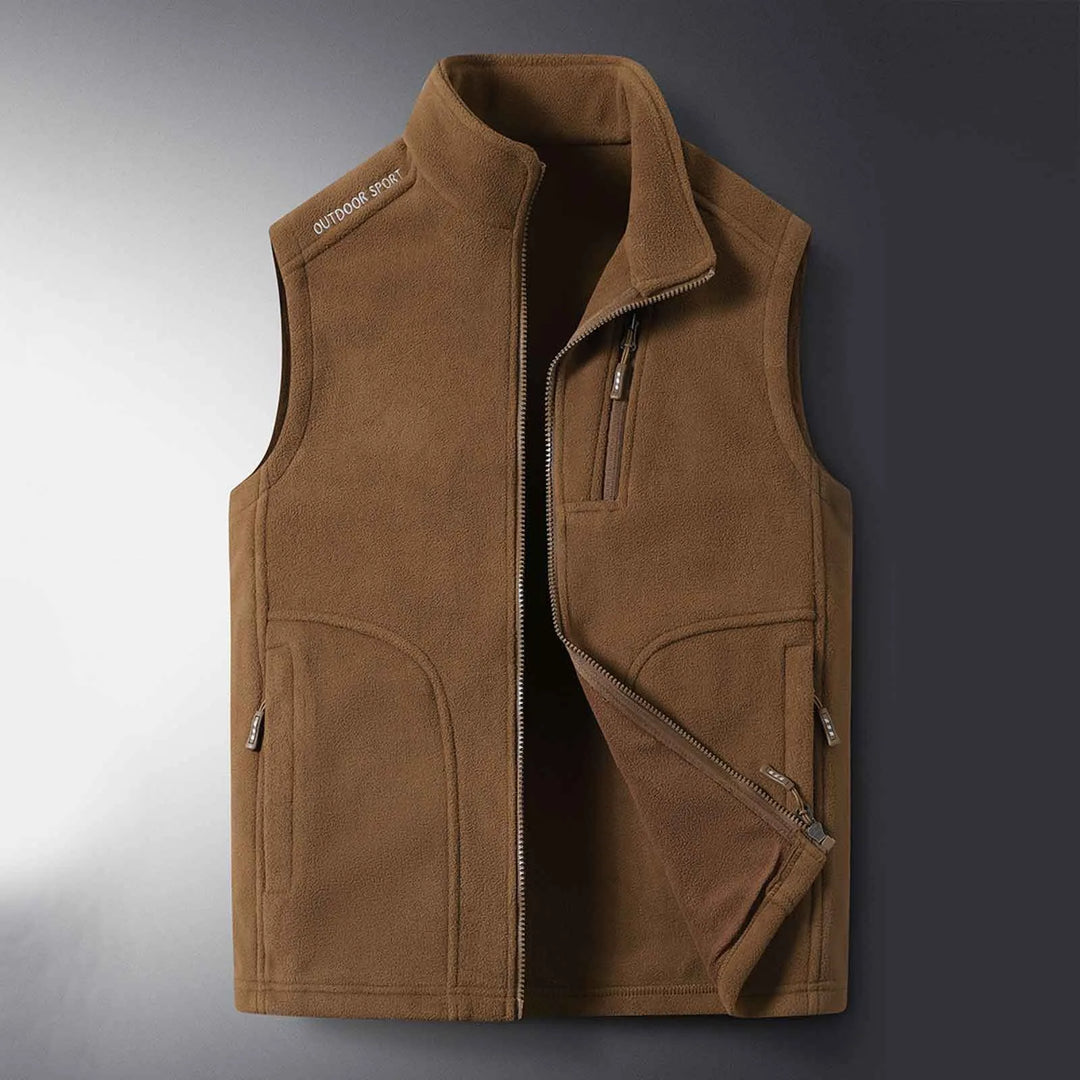 Stay warm outdoors with this unisex fleece vest. Lightweight, insulated, and perfect for hiking & layering.