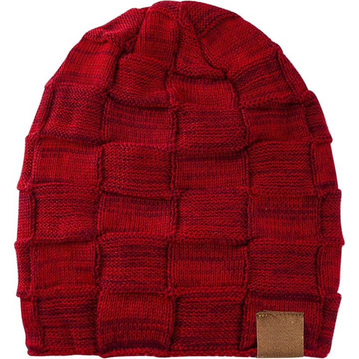 Knitted slouchy beanie, demonstrating its flexibility and soft feel, a must-have winter item