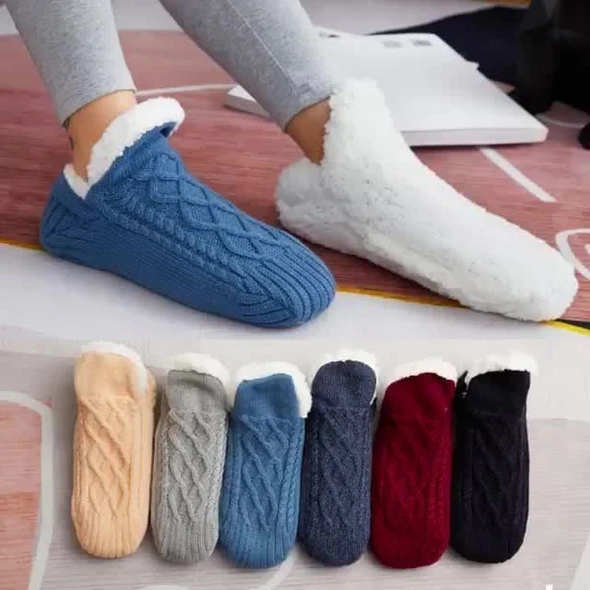 Unisex warm thermal indoor socks with non-slip grips for ultimate winter comfort and safety.