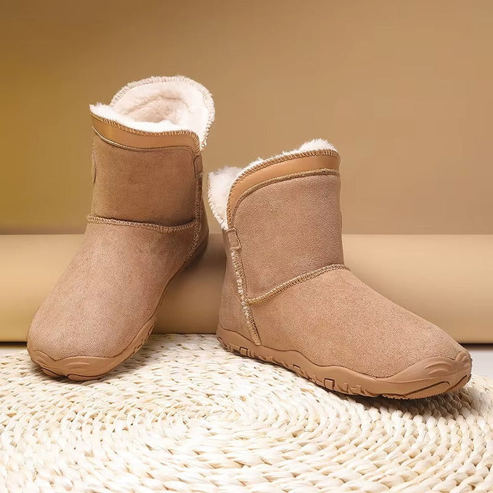 Natural movement unisex barefoot winter boots, engineered with a flexible sole for optimal foot health.