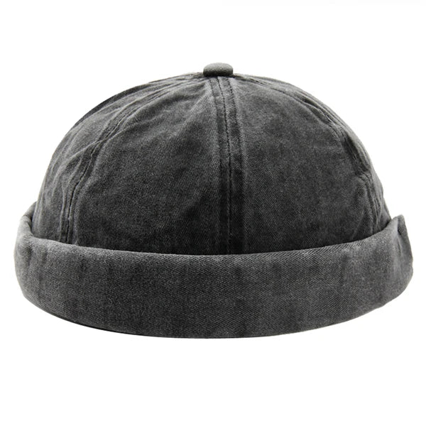 Person wearing a comfortable adjustable unisex brimless cotton cap with a washed, modern look.