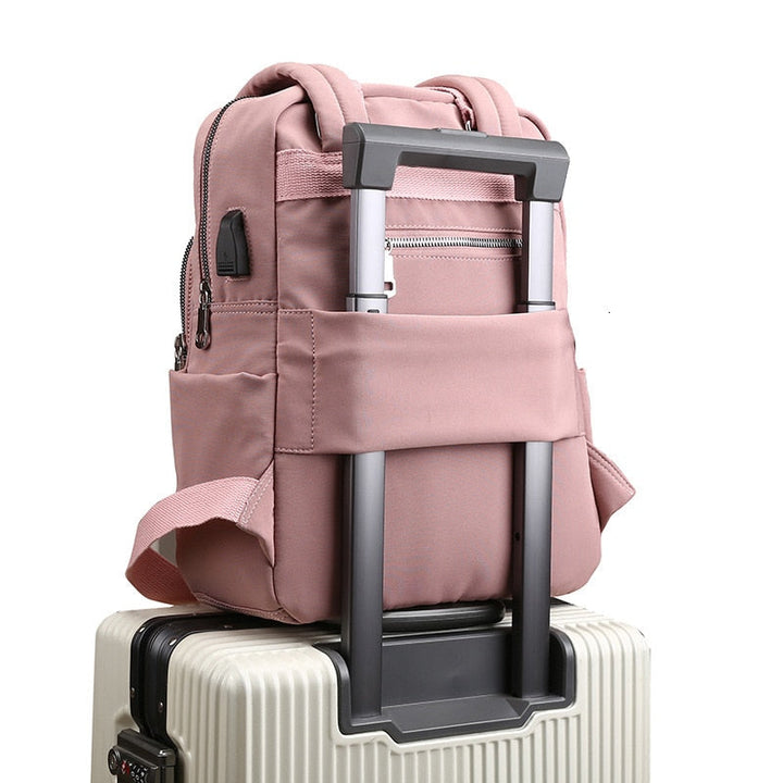 Unisex water-resistant anti-theft backpack with USB charging port, front view