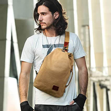 Premium canvas crossbody bag, water-resistant & durable. Features a hidden anti-theft pocket for valuables.