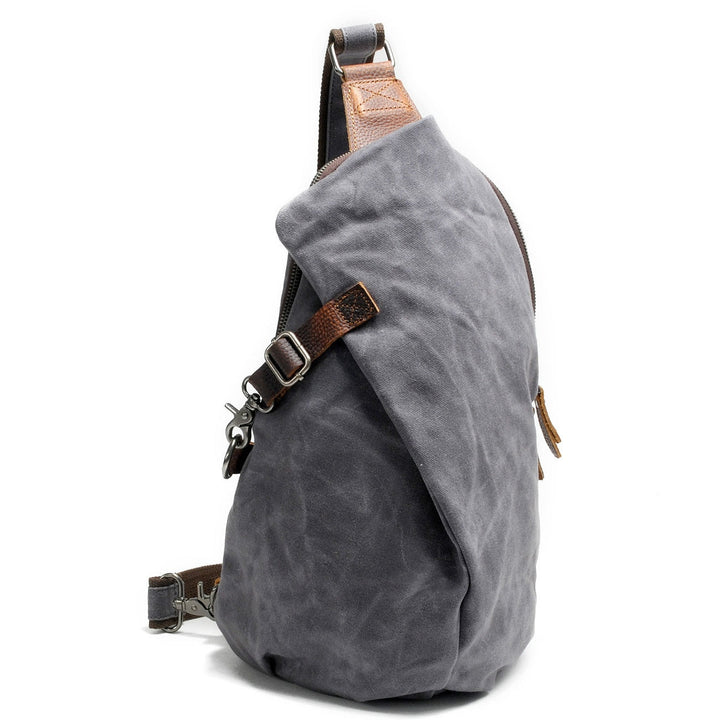 Everyday essentials organized in a water-resistant canvas shoulder bag. Anti-theft pocket adds security for travel.