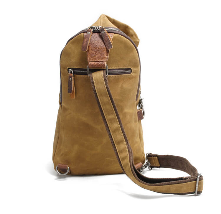 Durable water-resistant canvas shoulder bag for men & women. Secure anti-theft pocket. Great for travel.