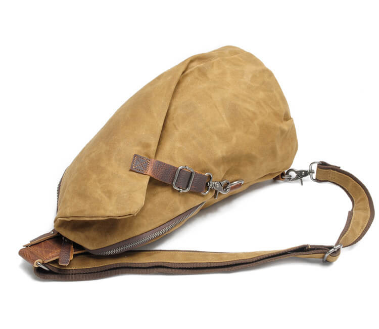 Water-resistant canvas day trip bag with anti-theft features. Comfortable unisex design, perfect for adventures.
