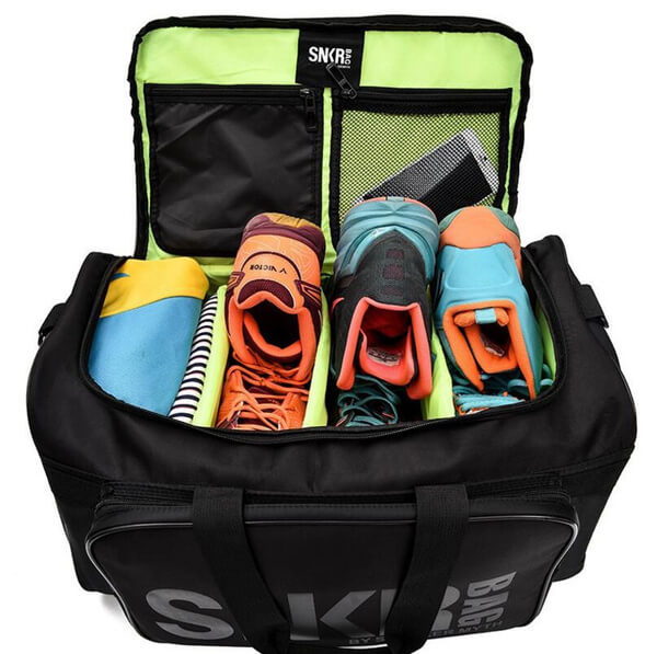 Stylish water-resistant gym bag, designed for sneakers, clothes, and athletic accessories.