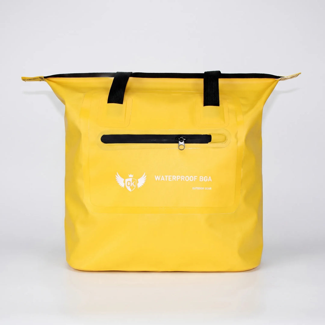 Bright yellow water-resistant shoulder tote bag, a stylish and functional dry bag for all outdoor activities.