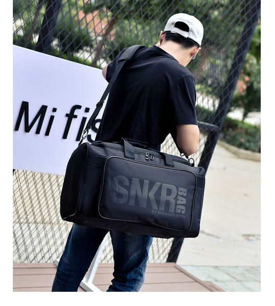 Unisex gear bag featuring multiple pockets and compartments for optimal organization