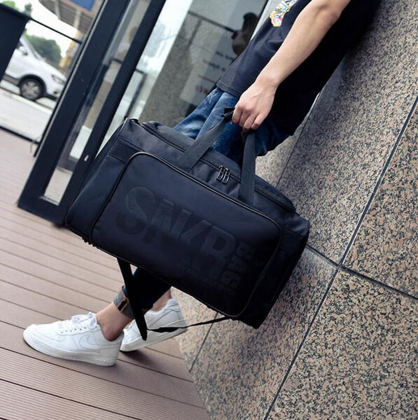 Travel bag for sneakers and sports gear, shown packed for an active lifestyle trip