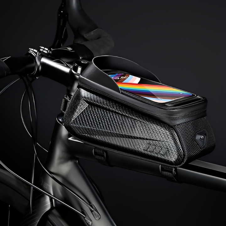 Bike frame bag with clear touchscreen phone holder, allowing easy GPS access and secure storage during cycling trips.