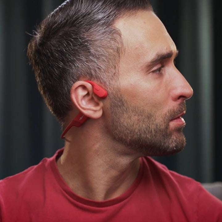 Unisex waterproof bone conduction headphones with Bluetooth wireless for sports.