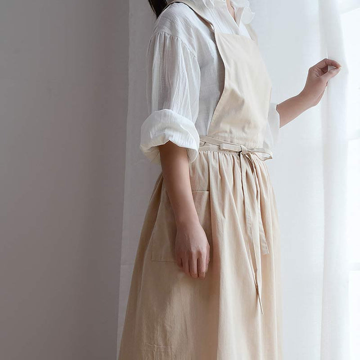 Premium waterproof cotton baking apron, durable and equipped with useful pockets.