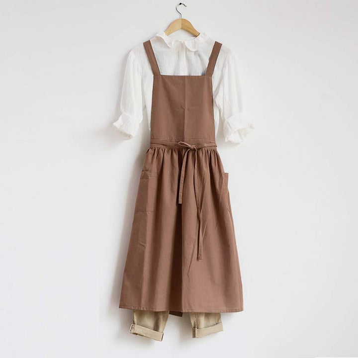 Modern waterproof cotton kitchen apron, unisex design, with multiple utility pockets.
