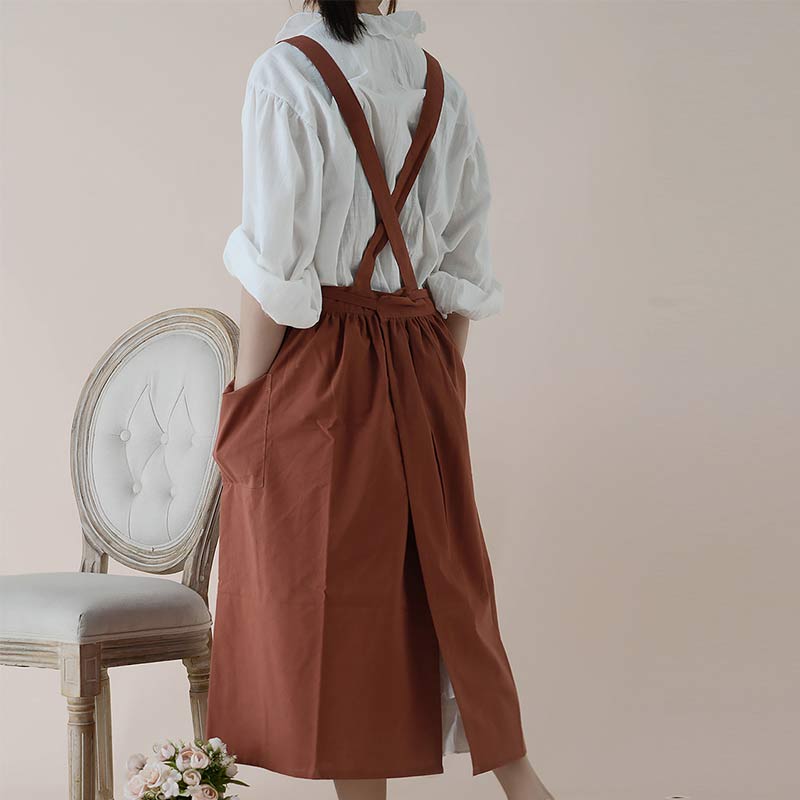 Navy blue waterproof cotton baking apron, unisex, with easy-reach chest pockets.
