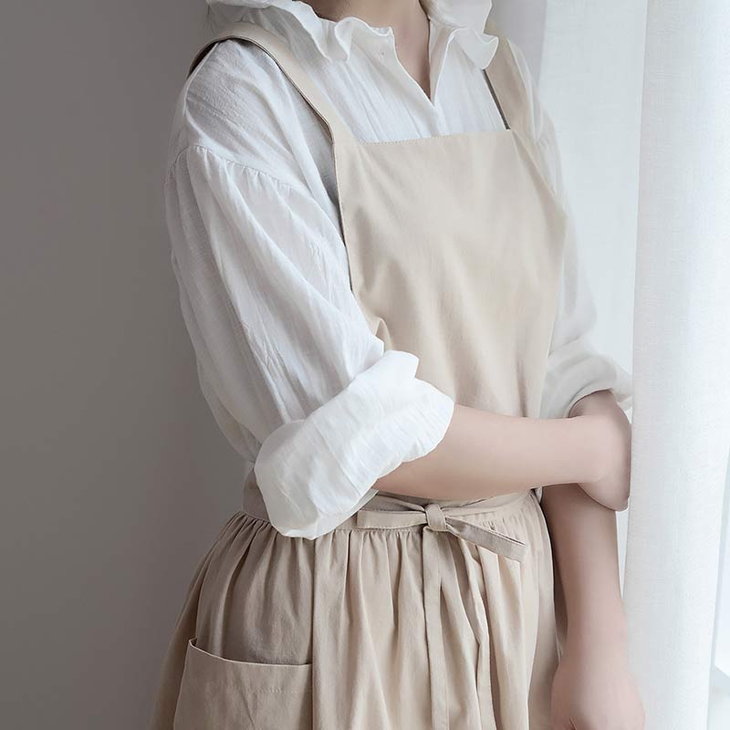 Burgundy waterproof cotton cooking apron, unisex, great for baking, with handy pockets.