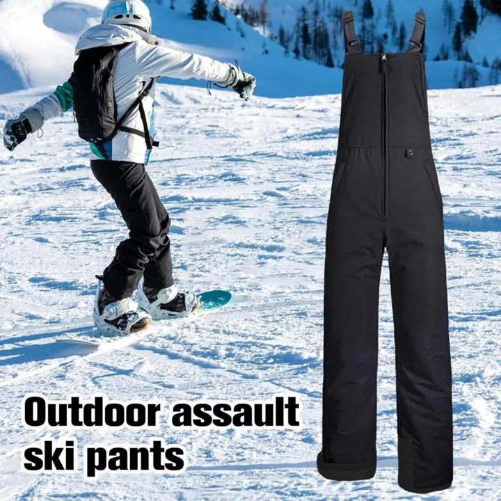 Close-up of waterproof fabric and insulation on unisex snowboarding ski bibs in blue, cold weather gear.