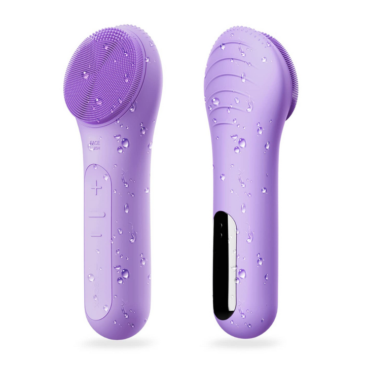 Person using a unisex waterproof rechargeable facial cleansing brush for a gentle face massage and exfoliation.