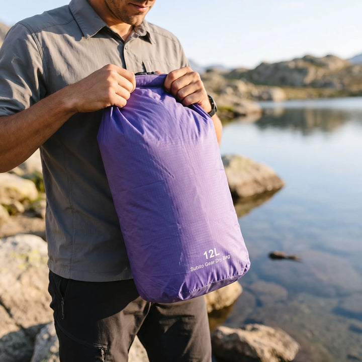 Unisex waterproof dry bag, perfect for keeping essentials dry on any outdoor adventure: hiking, kayaking, boating.