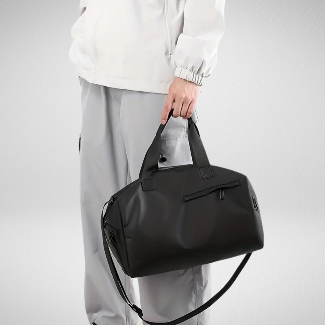 Essential waterproof sports & gym duffel with a dedicated shoe compartment, versatile for travel.