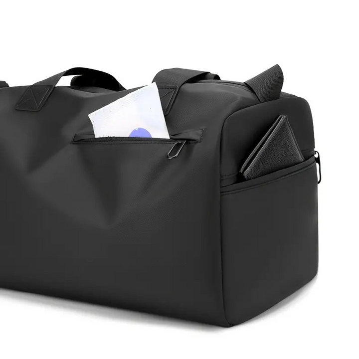 Heavy-duty waterproof sports bag for all genders, includes a ventilated shoe compartment.