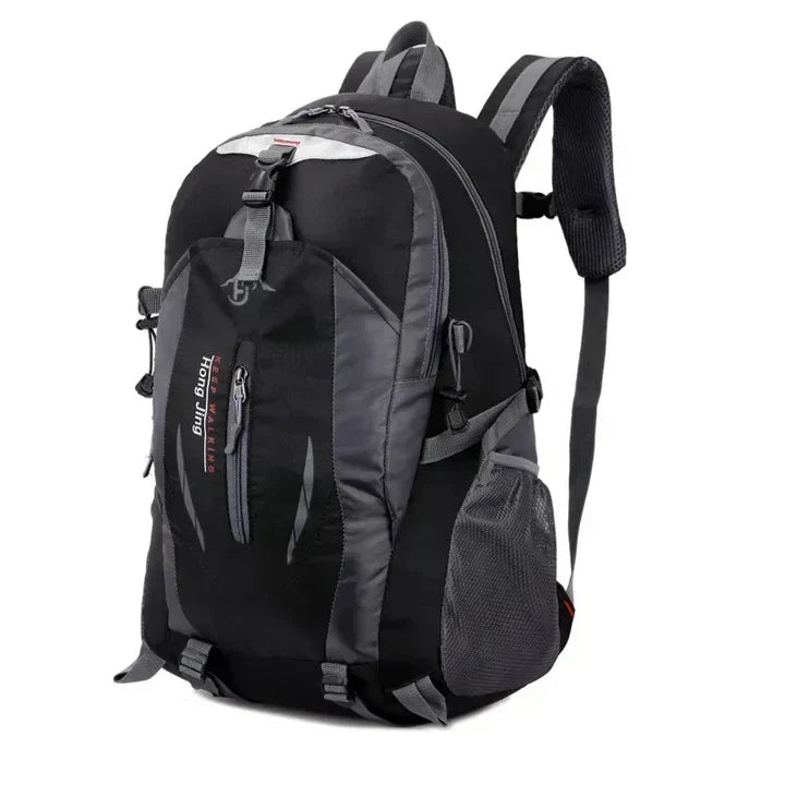 Black waterproof travel backpack with multiple organized compartments. Ideal for unisex daily carry & adventure gear.