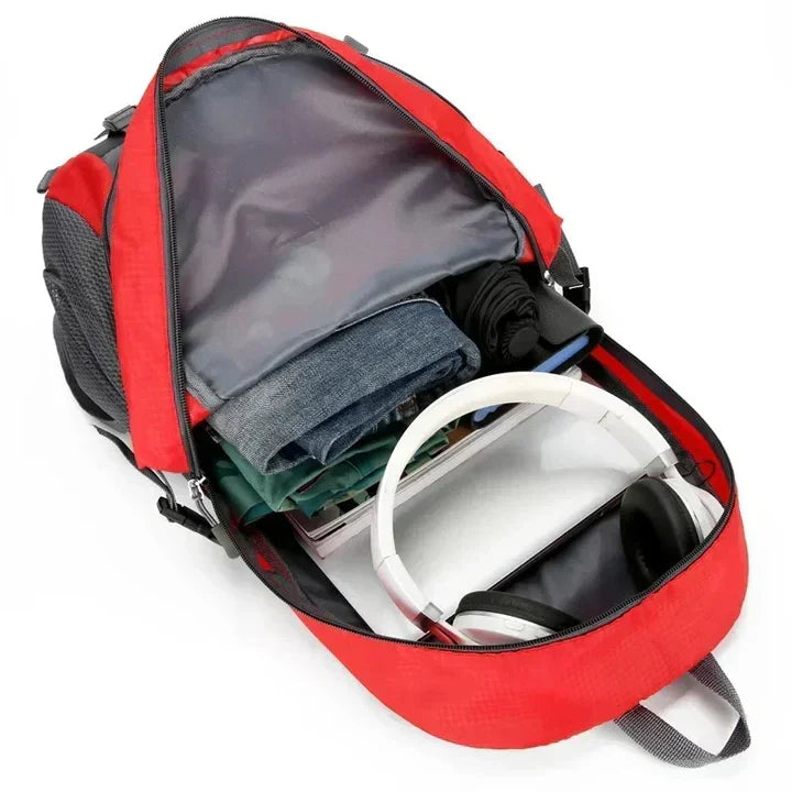 Green waterproof travel backpack with organized compartments. Unisex durable pack for adventure, commuting & daily carry.