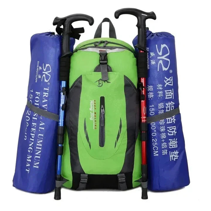Red waterproof travel backpack, perfect for organized adventure & daily carry. Durable unisex multi-compartment commuter bag.