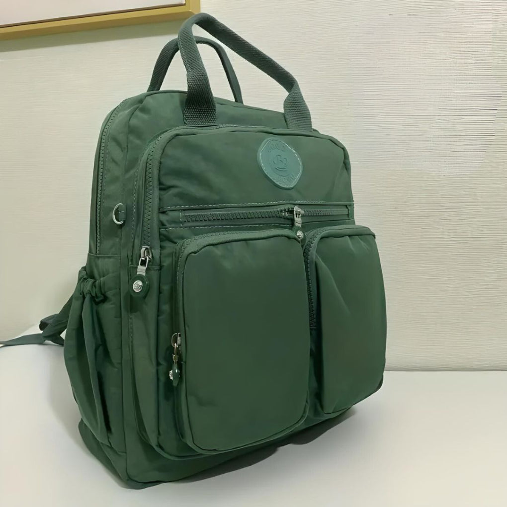Fashionable unisex urban backpack. Waterproof material, multiple functional pockets for school, work, & travel.