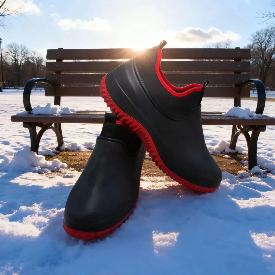 Industrial waterproof work boots, unisex, offering strong grip & protection for tough jobs.