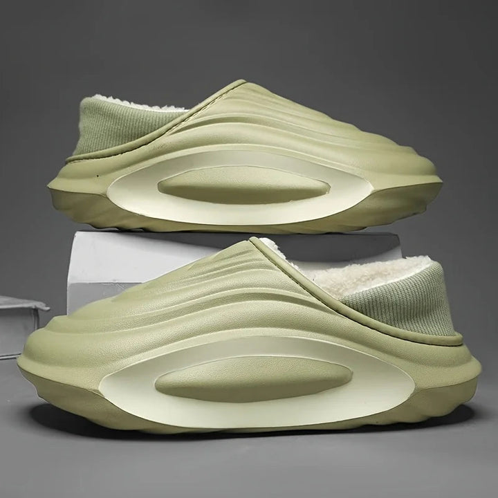 Soft fleece unisex slip-on slides with wave design, offering cushioned cozy comfort for casual wear.