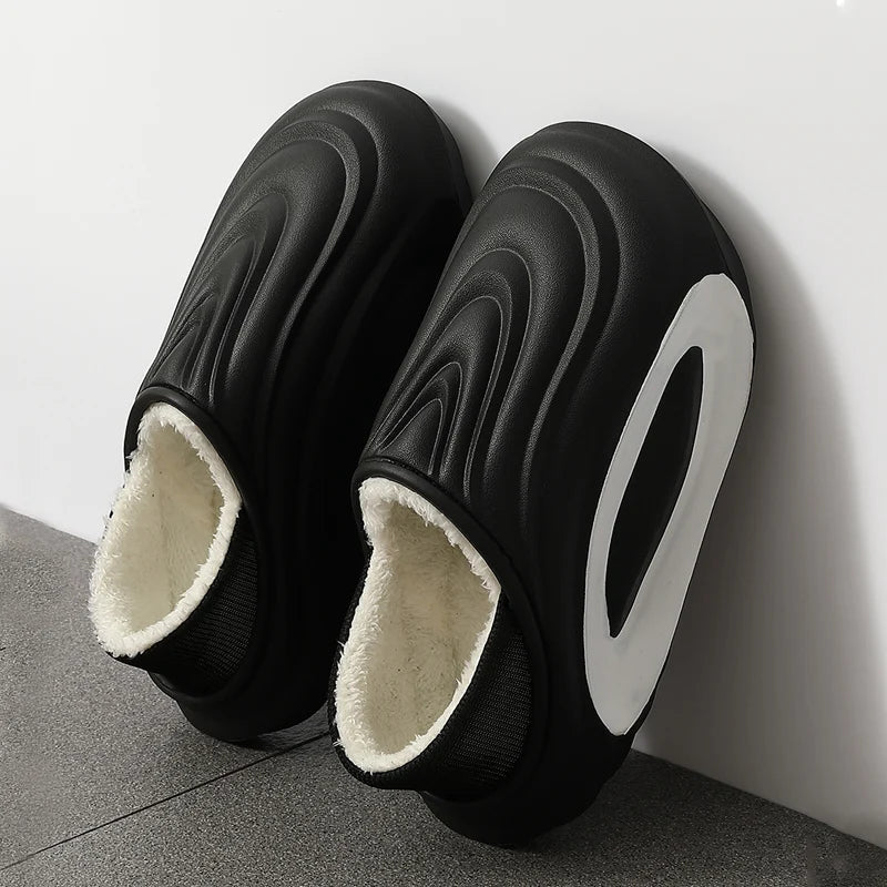 Easy slip-on unisex wave fleece slides, cushioned & comfortable, perfect casual modern footwear.