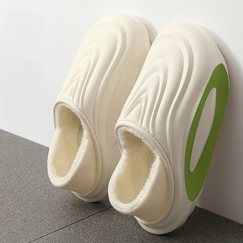 Unisex wave fleece slip-on slides, waterproof and cushioned for cozy, modern, casual comfort.