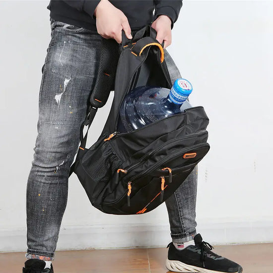 Front view: Organized unisex weather-resistant backpack, ideal for school, commute & everyday use.