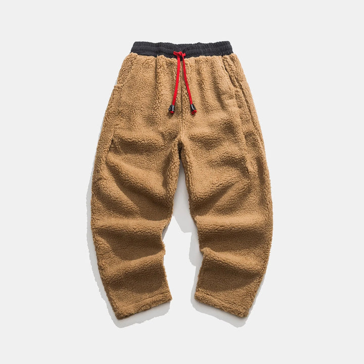 Green unisex jogger style sweatpants, cozy bottoms with drawstring waist, ideal for comfort and relaxed fit.