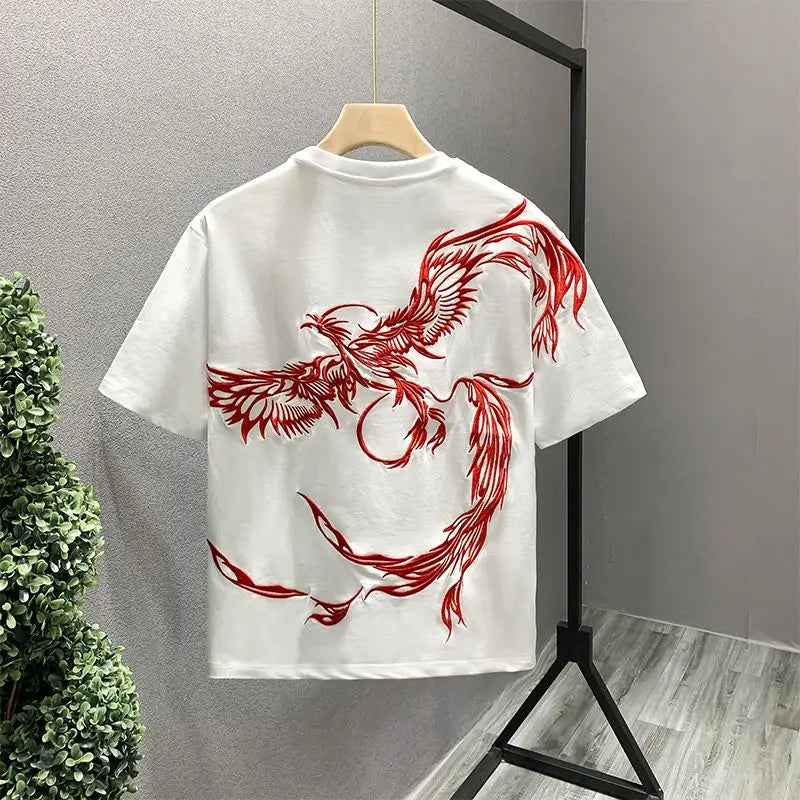 Unisex white cotton t-shirt with a detailed phoenix embroidery, perfect for a unique statement graphic tee.