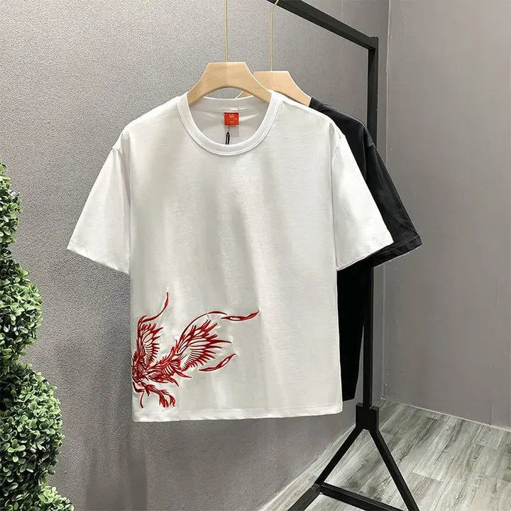 Black unisex embroidered phoenix t-shirt, made of soft cotton for a comfortable, stylish graphic tee.