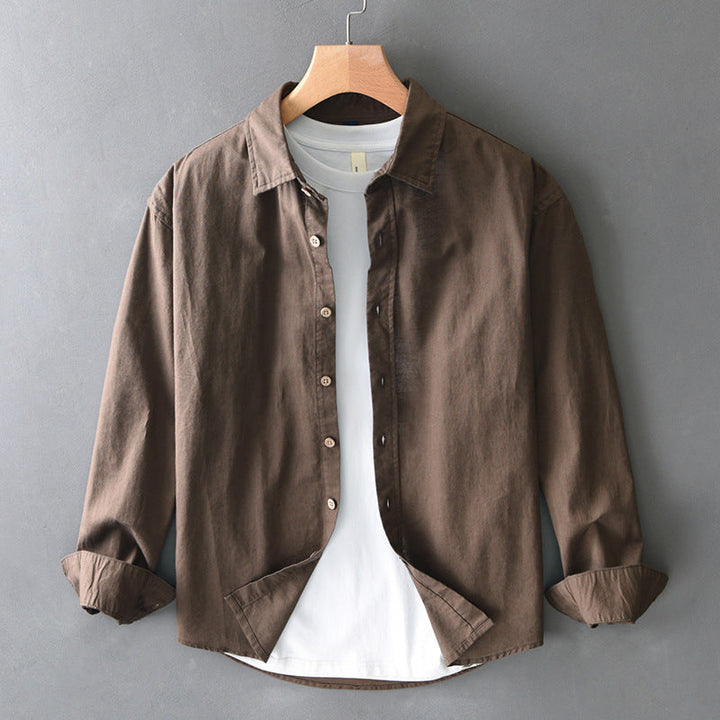 Casual brown unisex button-down shirt with a relaxed fit, perfect for everyday wear and comfort.