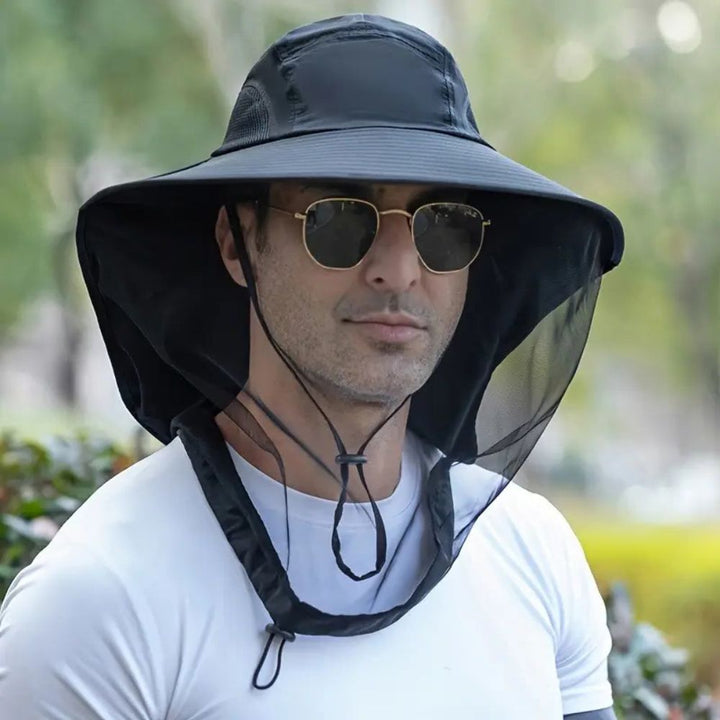 Unisex wide brim sun hat for UV & mosquito protection. Ideal for outdoor activities like hiking and fishing.