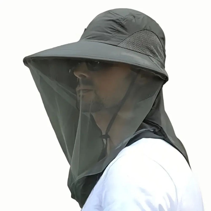 Versatile unisex wide brim safari hat. Breathable design offers UV & mosquito protection for travel and adventures.