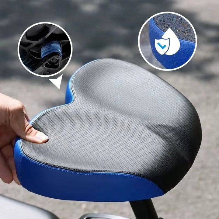 Unisex wide comfort bike saddle with thick cushioning for long, comfortable cycling rides.